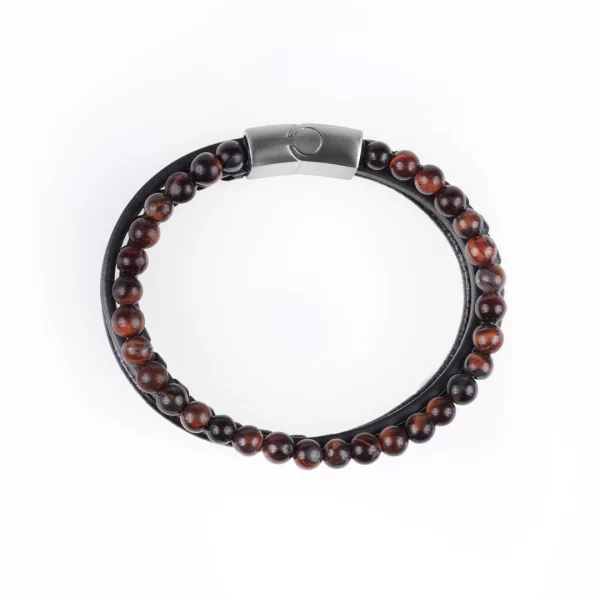 bracelet pour homme en oeil de taureau et cuir synthétique. photo sur fond blanc vue de haut