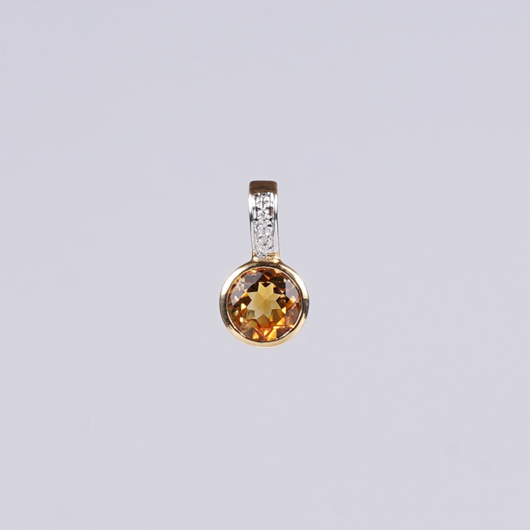 pendentif en citrine, diamants et or, photo sur fond blanc